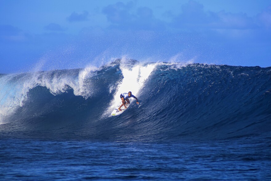 French Vahine Fierro rides a wave during the Tahiti Pro surfing competition, a test event for the Paris 2024 Olympics Games in Teahupo'o, French Polynesia in the Pacific Ocean, Friday, Aug. 11, 2023. (AP Photo/Esther Cuneo)