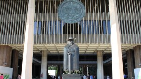 FILE - The Father Damien Statue welcomes visitors to the Hawaiʻi State Capitol on Jan. 18, 2023.