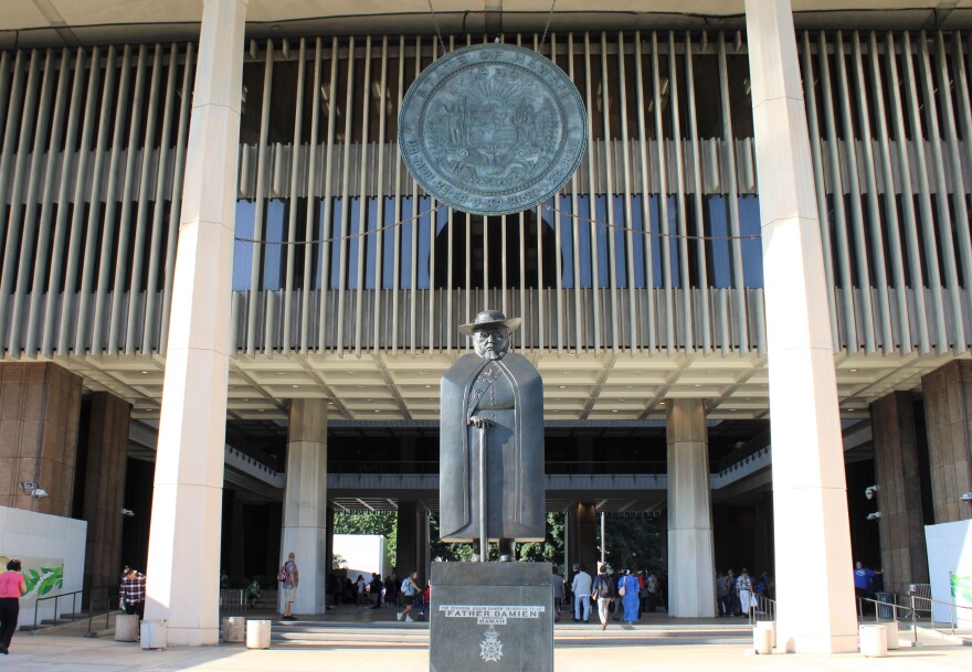 FILE - The Father Damien Statue welcomes visitors to the Hawaiʻi State Capitol on Jan. 18, 2023.