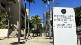 A sign for the Prince Jonah Kūhiō Kalanianaʻole Federal Building and Courthouse is displayed outside the courthouse on Monday, Jan. 22, 2024, in Honolulu. (AP Photo/Jennifer Kelleher)