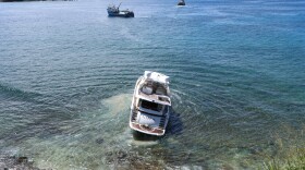 The Nakoa, one of two luxury yachts owned by Noelani Yacht Charters, was banked on a reef about 700 feet outside the Honolua-Mokulēʻia Bay Marine Life Conservation District on Feb. 20, 2023.