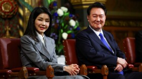 South Korea's President Yoon Suk Yeol sits with his wife Kim Keon Hee, after he addressed MPs in the Royal Gallery during a visit to the Palace of Westminster on Nov. 21, 2023 in London, England.