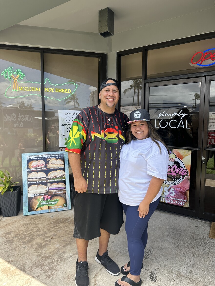 Starlet and Clint Joao, founders of Maika'i Market, in front of the shop they manage, Simply Local.