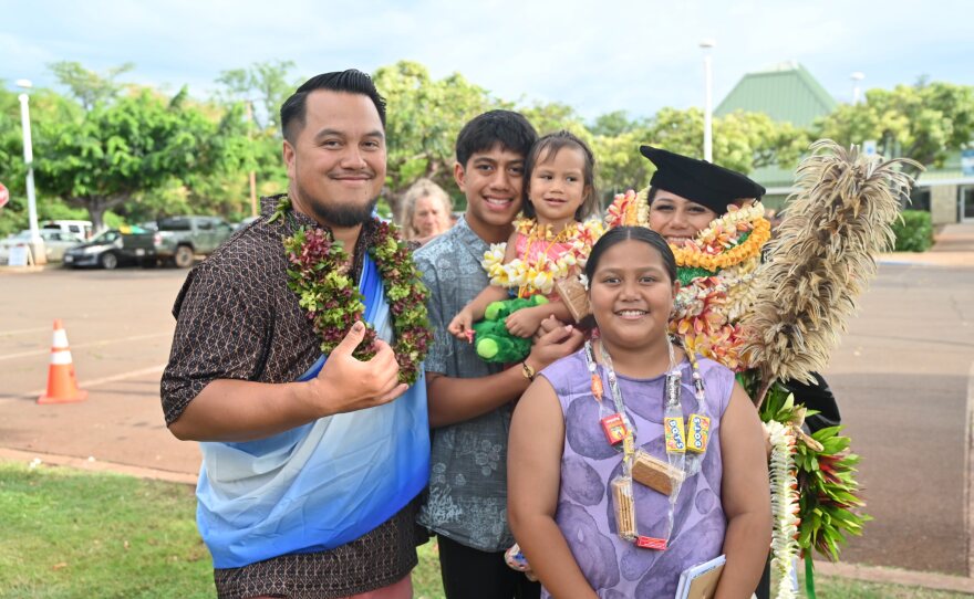 Pūlama Lima is pictured here with her family celebrating her doctorate accomplishments.