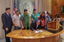 Gov. Josh Green signs bill regulating short term rentals on May 3, 2024.