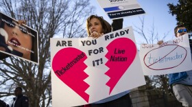 Penny Harrison and her son Parker Harrison rally against the live entertainment ticket industry outside the U.S. Capitol last year.