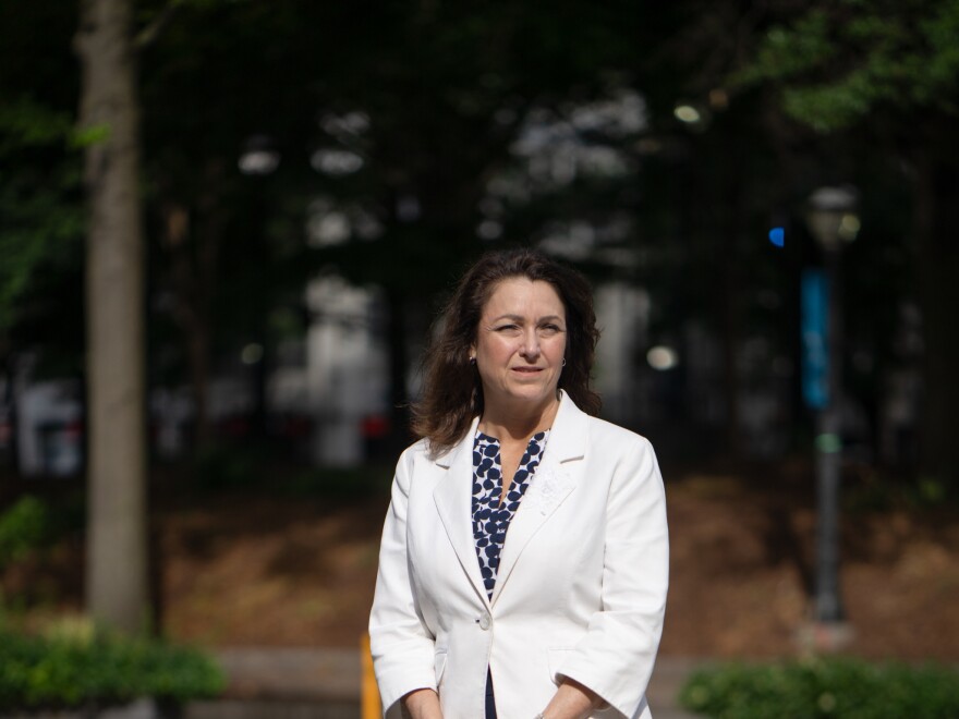 Kim Jones, the Executive director of NAMI, stands for a portrait in downtown Atlanta. 