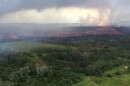 In this aerial photo provided by the U.S. Geological Survey, lava flows from fissure 8 near Pāhoa, Hawaiʻi on Wednesday, May 30, 2018. (U.S. Geological Survey via AP)