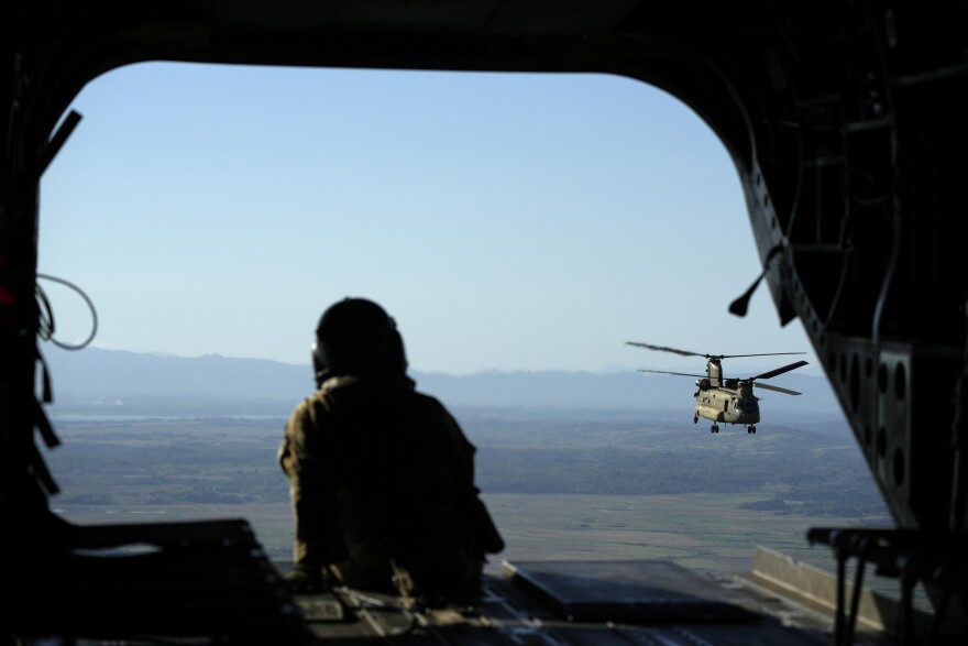 A U.S. Army CH-47 helicopter flies over Cagayan province, northern Philippines during a joint military exercise on Monday, May 6, 2024. American and Filipino marines held annual combat-readiness exercises called Balikatan, Tagalog for shoulder-to-shoulder, in a show of allied military readiness in the Philippines' northernmost town facing southern Taiwan.