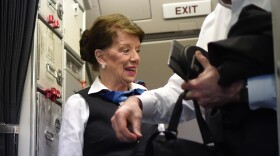 American Airlines flight attendant Bette Nash greets passengers disembarking from her daily return flight to Boston at Reagan Washington Airport in 2017, at age 81. She died earlier this month.