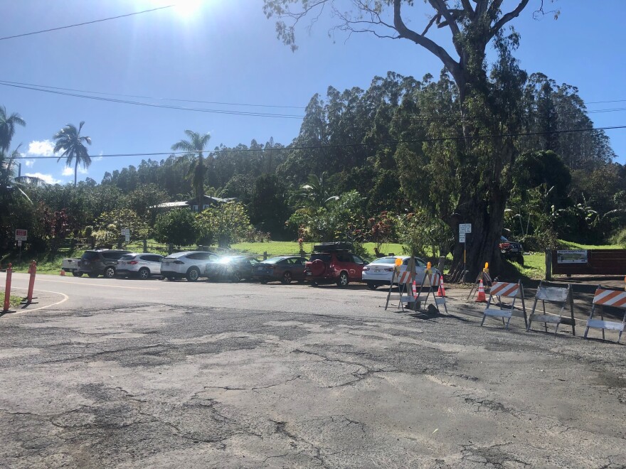 Parked cars took the place of the Protect Waipiʻo Valley checkpoint.