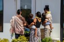 The Fraser 'ohana received the keys to their modular home at Maui Lani after a blessing of the new house.