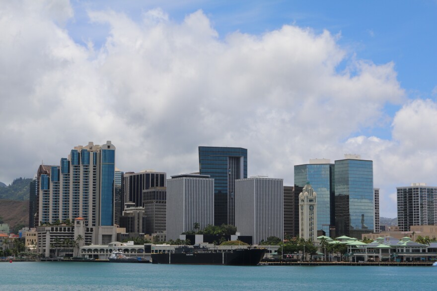 FILE - Downtown Honolulu fronted by Aloha Tower Marketplace