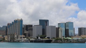 FILE - Downtown Honolulu fronted by Aloha Tower Marketplace