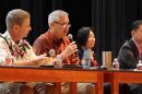 House Speaker Scott Saiki speaks about condo insurance at a town hall at McKinley High alongside other legislators and industry members on March 12, 2024.