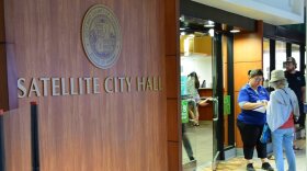 Passport applicants line up at Ala Moana Satellite City Hall on Aug. 1, 2022.