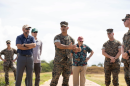 U.S. Marine Corps Col. Speros Koumparakis, commanding officer, Marine Corps Base Hawaiʻi, discusses concerns from community members with elected officials during a tour of Puuloa Range Training Facility, Hawaiʻi, April 17, 2023.