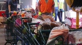 File - The Pantry in Kalihi has its online food distribution operations down to assembly-line precision.