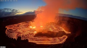 In this webcam image provided by the U.S. Geological Survey, an eruption takes place on the summit of the Kīlauea volcano Wednesday June 7, 2023.