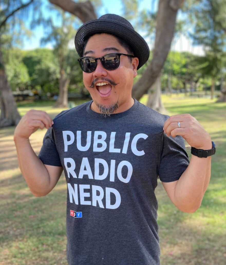 HPR's Nick Yee models our Public Radio Nerd t-shirt