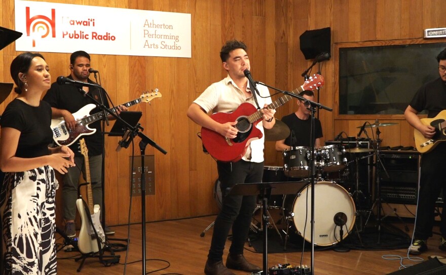 Left to right: Tiara Gomes (vocals), Wil Tafolo (bass), Evan Khay (vocals), Beck Millan (drums), and Hiʻi Copp (guitar) record their set in the Atherton Performing Arts Studio. Due to unforeseen circumstances, Evan Khay's public performance was cancelled. However, HPR will be releasing audio and video of his private in-studio performance as part of the series.