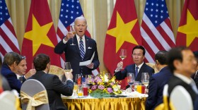 U.S. President Joe Biden raises a toast as he participates in a State Luncheon with Vietnam President Vo Van Thuong in Hanoi, Vietnam, Monday, Sept. 11, 2023. (AP Photo/Evan Vucci)