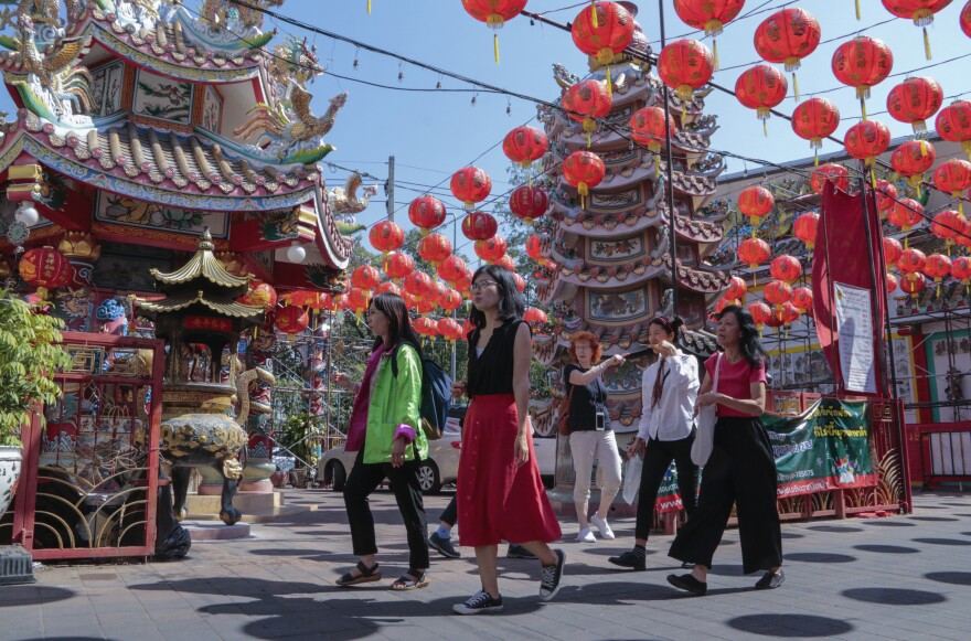 FILE - Chinese tourists tour Pung Tao Gong Chinese Temple in Chiang Mai province, northern Thailand, on Jan. 23, 2023.