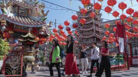 FILE - Chinese tourists tour Pung Tao Gong Chinese Temple in Chiang Mai province, northern Thailand, on Jan. 23, 2023.