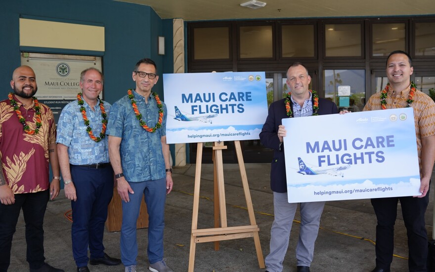 Local official and leaders announce the Maui CARES Flights program for survivors of the Maui fires. From left to right: Dustin Kaleiopu, lead for Council for Native Hawaiian Advancement Kākoʻo Maui Resource Center; Jon Kimball, vice president of Marriott International Market – Hawai‘i and French Polynesia; Ben Minicucci, CEO of Alaska Airlines; Gov. Josh Green; Josiah Nishita, managing director for Maui County, head of Maui Office of Recovery.