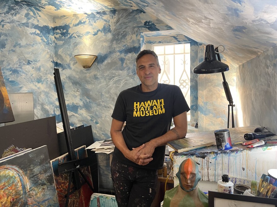 Native Hawaiian artist Solomon Enos poses for a portrait in his studio at the Capitol Modern.