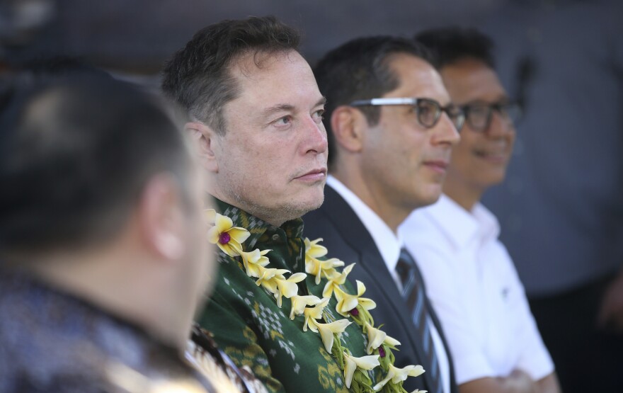 Elon Musk, second from left, attends the launch of Starlink satellite internet service at a public health center in Denpasar, Bali, Indonesia on Sunday, May 19, 2024. Elon Musk arrived in Indonesia's resort island of Bali to launch Starlink satellite internet service in the world's largest archipelago nation. (AP Photo/Firdia Lisnawati)