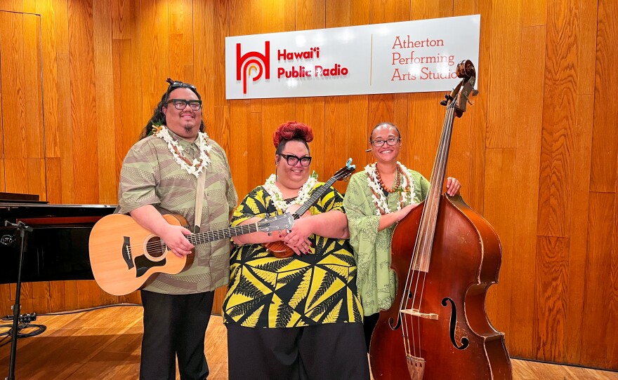 Cousins Lina Robins-Tamure, Heather Kapuaokamakahala Kalua and Jordan ʻĀina Asing come together as the beloved Hawaiian music trio, ʻUheʻuhene.