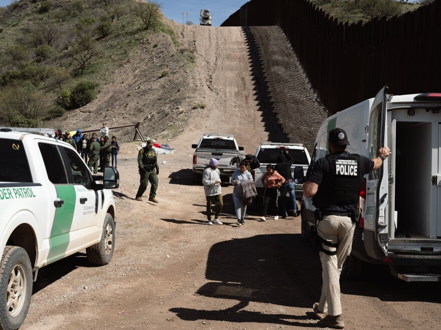 Border Patrol picks up a group of asylum seekers from an aid camp at the US-Mexico border near Sasabe, Arizona, US, on Wednesday, March 13, 2024. During the first four months of fiscal year 2024, Border Patrol recorded more than 250,000 migrant apprehensions in the Tucson sector in Arizona, the most of any region patrolled by the agency, according to federal government statistics, reports CBS. Photographer: Justin Hamel/Bloomberg via Getty Images