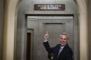 House Speaker Kevin McCarthy of California gestures toward the newly installed nameplate at his office after he was sworn in as speaker of the 118th Congress.