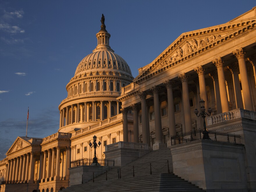 The morning sun illuminates the U.S. Capitol on Monday.