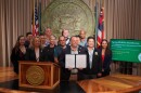 Gov. Josh Green signs measure to provide hundreds of millions of dollars for Maui recovery efforts.