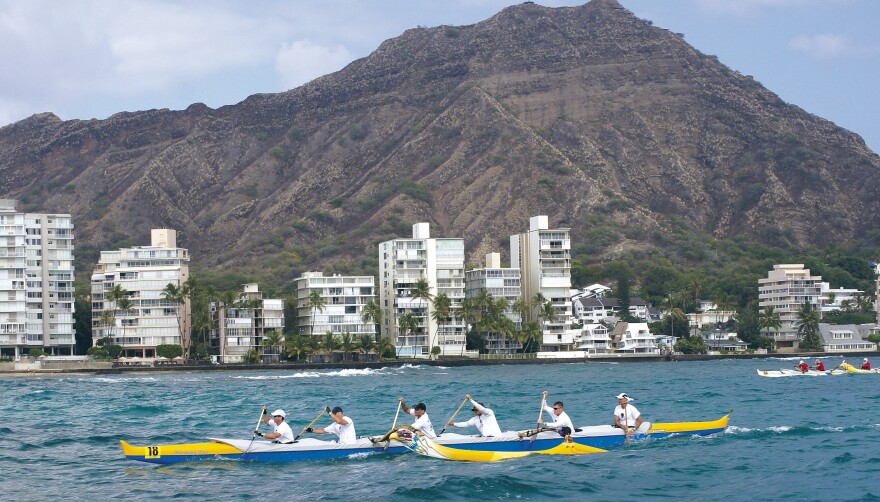 FILE - Team Special Operations Forces Molokai Hoe 2012 haul past Diamond Head. (Oct. 7, 2012)