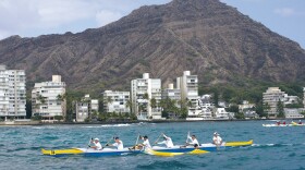 FILE - Team Special Operations Forces Molokai Hoe 2012 haul past Diamond Head. (Oct. 7, 2012)