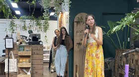 Jordyn Imig performs in front a crowd at a local plant shop in Kaimuki to prepare for the Poetry Out Loud competition in Washington, D.C., next week.