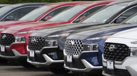 FILE - 2022 Santa Fe sports-utility vehicles sit outside a Hyundai dealership Sunday, Sept. 12, 2021, in Littleton, Colo. (AP Photo/David Zalubowski)