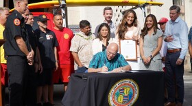 Honolulu Mayor Rick Blangiardi signs a resolution to create a new standalone Ocean Safety Department. (May 29, 2024)