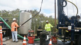 FILE - Contractors drill a new groundwater monitoring well near the Red Hill Shaft. (July 26, 2022)