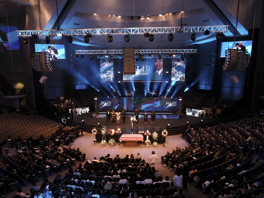 The funeral for slain airman Roger Fortson is held at New Birth Missionary Baptist Church, Friday near Atlanta.