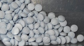 FILE - This undated file photo provided by the U.S. Attorneys Office for Utah and introduced as evidence at a trial shows fentanyl-laced fake oxycodone pills collected during an investigation. (U.S. Attorneys Office for Utah via AP, File)