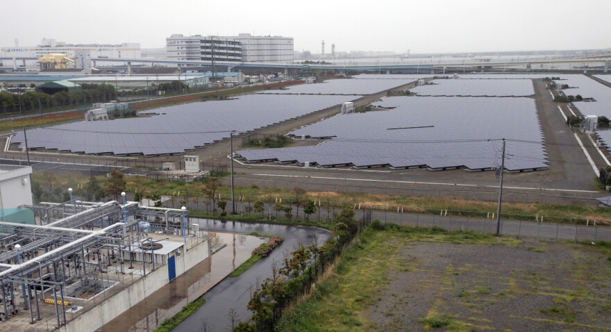 FILE - In this 2012 photo, solar panels cover the 11-hectare compound of the Ukishima Solar Power Station in Kawasaki near Tokyo.