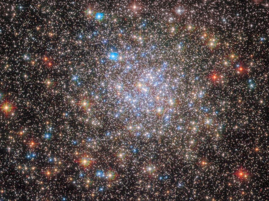  The scattered stars of the globular cluster NGC 6355, that resides in our Milky Way, seen in this image from the Hubble Space Telescope