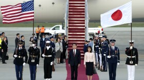 Japan's Prime Minister Fumio Kishida, center left, and his wife Yuko Kishida, center right, participate in an arrival ceremony at Andrews Air Force Base, Md., Monday, April 8, 2024. President Joe Biden will host a State Dinner for Kishida during his official visit to the United States on Wednesday. (AP Photo/Susan Walsh)