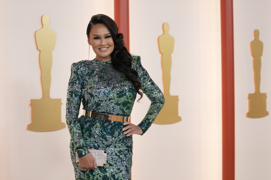 FILE - Tia Carrere arrives at the Oscars on Sunday, March 12, 2023, at the Dolby Theatre in Los Angeles. (AP Photo/Ashley Landis)