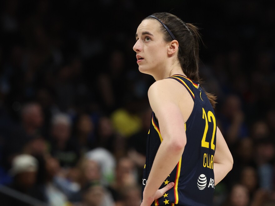 Caitlin Clark of the Indiana Fever looks on while playing the Dallas Wings during a preseason game at College Park Center on May 3 in Arlington, Texas.