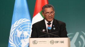 FILE - Tuvalu Prime Minister Kausea Natano speaks during a plenary session at the COP28 U.N. Climate Summit, Saturday, Dec. 2, 2023, in Dubai, United Arab Emirates. (AP Photo/Rafiq Maqbool)